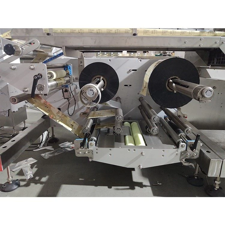 bottom dual film roll flow pack machine pillow packaging machinery automatic China supplier bottom dual film roll flow pack machine pillow packaging machinery automatic China supplier